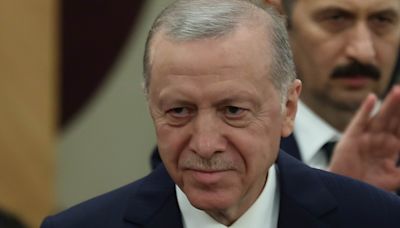 Turkey's President SLAPS a child on the face for not kissing his hand