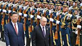 Xi lauds China-Russia ties as Putin arrives in Beijing