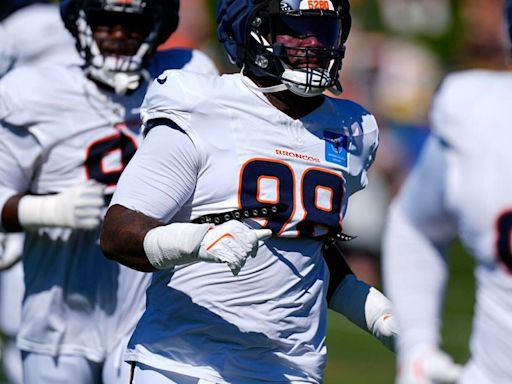 John Franklin-Myers fired up for Broncos home debut after 4-year-old son throws out balls before game