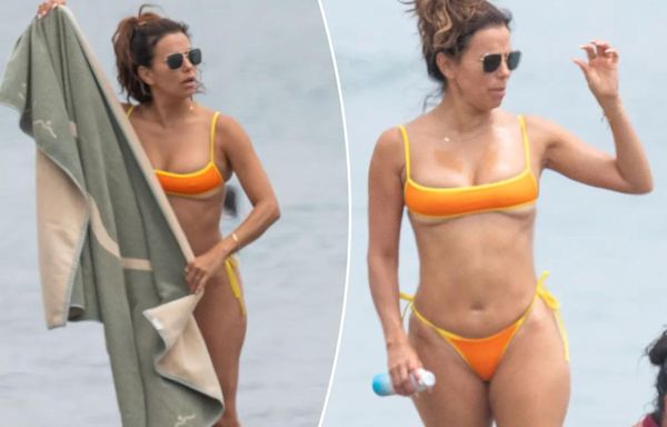 Eva Longoria shows some skin in a cheeky bikini on Spanish beach