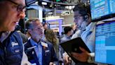 Wall Street ends down, snaps weekly winning streak on Fed worries