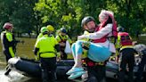 Hundreds are rescued from their homes after Houston area flooding