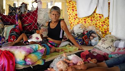 Flooding forecast to worsen in Brazil's south, where often only the poor remain