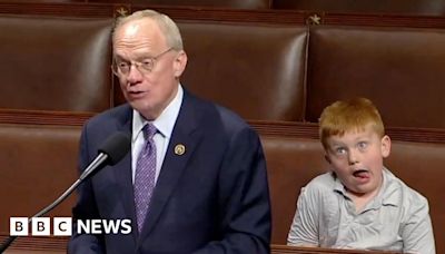 Son's funny faces overshadow lawmaker's House speech