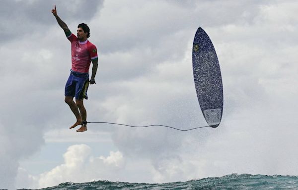 2024 Olympics: Brazilian surfer Gabriel Medina appears to defy gravity in spectacular photo from record-setting wave