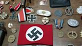 Buscaban pistas de una banda narco y secuestraron medallas, monedas y un casco con insignias nazis