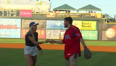 Drake's Katie Dinnebier throws out first pitch at Iowa Cubs game