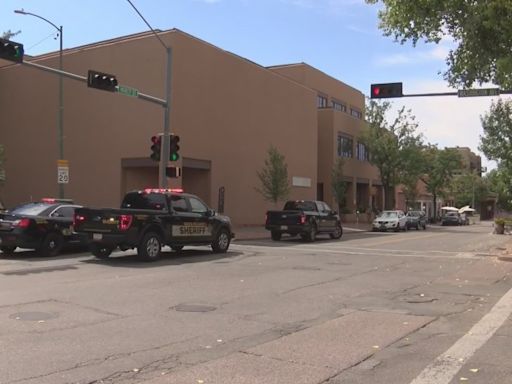 Shooting in Santa Fe cancels events; suspect in custody