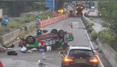 的士葵涌道撼防撞欄「反肚」司機被困 碎片擊毀巴士車窗兩乘客受傷