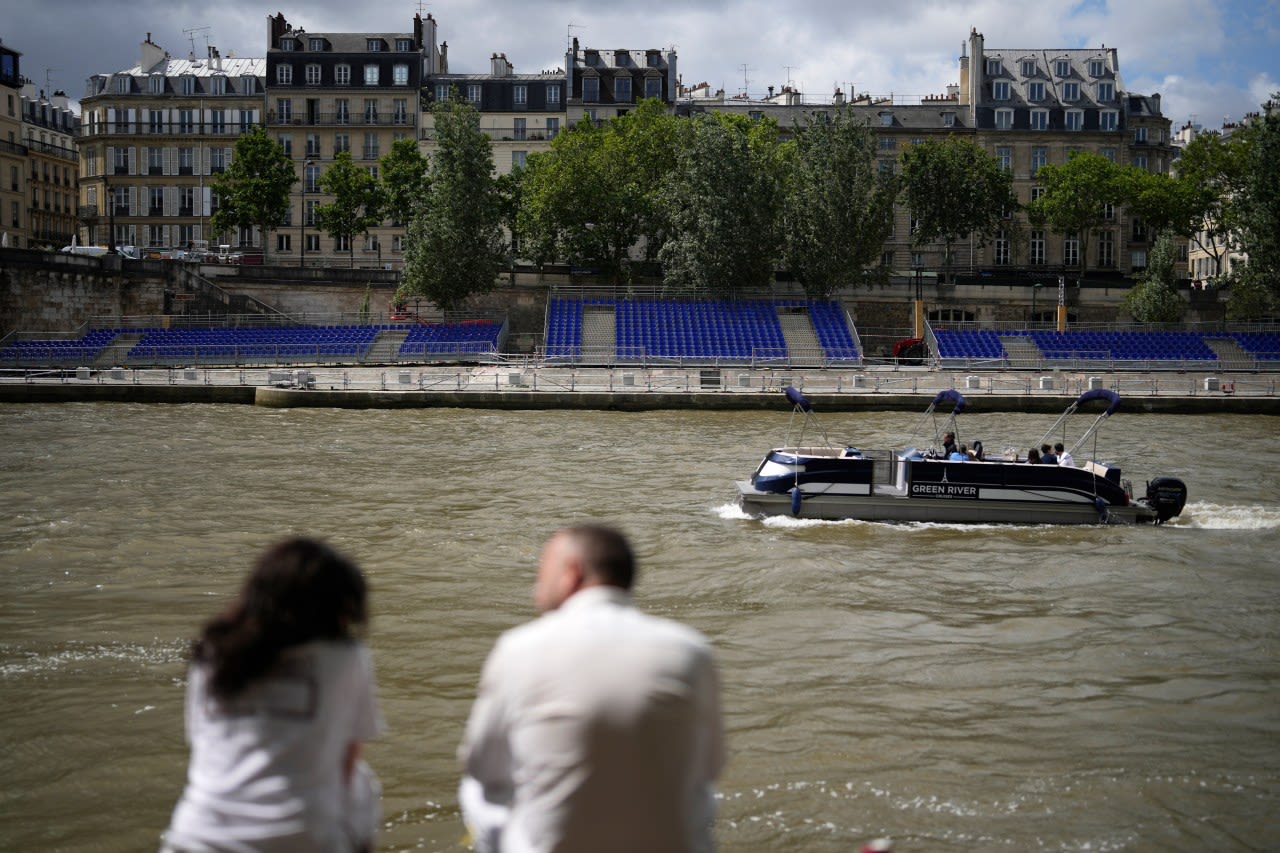 French sports minister takes a dip in the Seine ahead of Paris Olympics