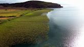 Scientists uncover 8,000-year-old village underwater, find "treasure trove"