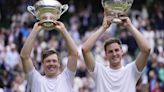 British former Wimbledon stat man wins title as partner breaks down in tears