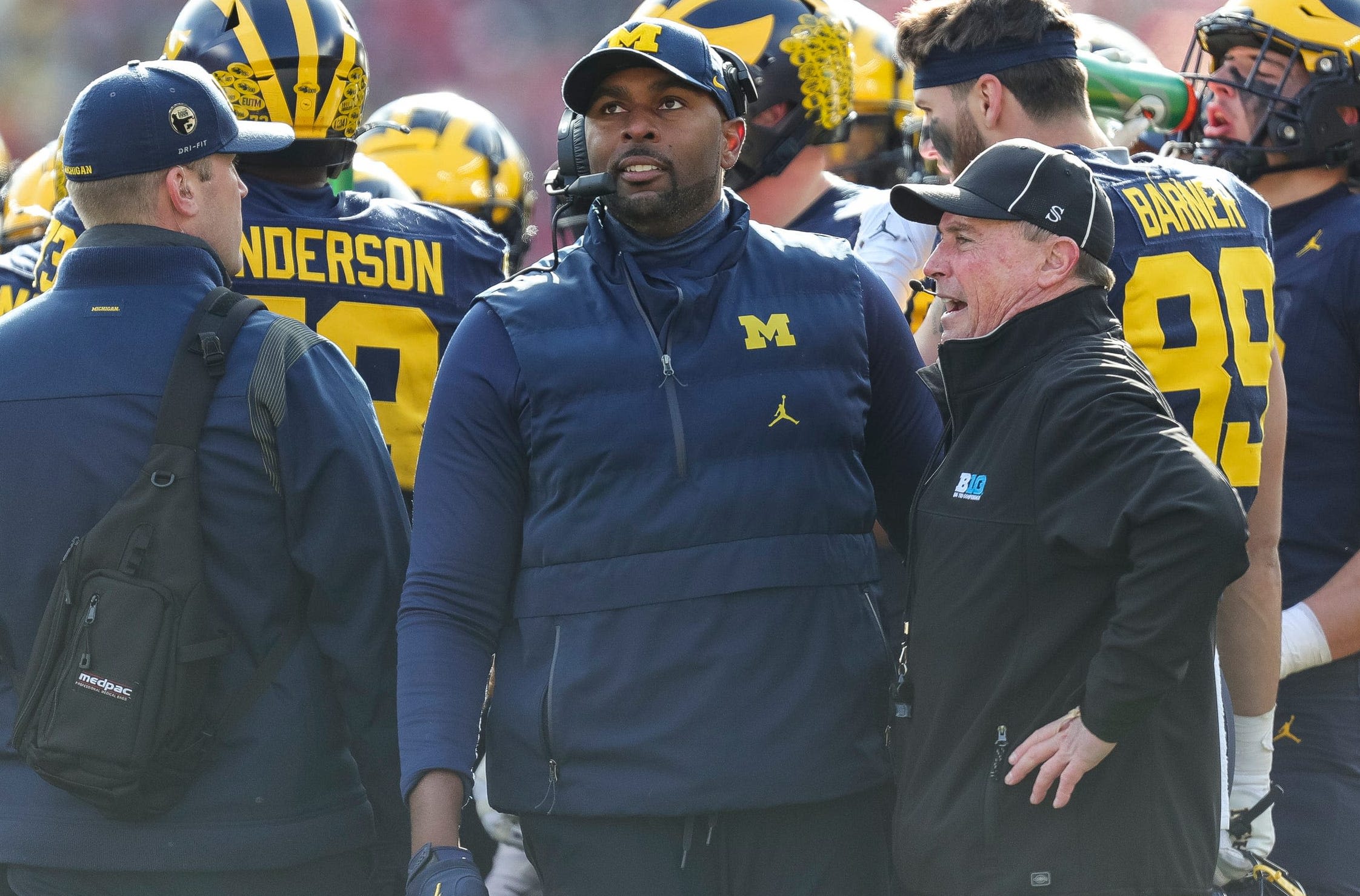 Replacing a championship coach is hard. But Sherrone Moore has to clean up Jim Harbaugh's mess, too.