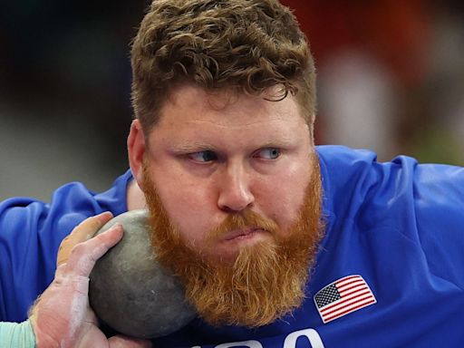 Athletics-American Crouser does enough at start of bid for shot put 'three-peat'