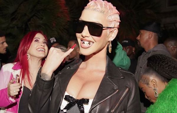 Incomparable Clownery: Disappointing Dorito Endorser Amber Rose Adorns Herself In Donald Trump-Themed Jewelry