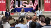 Jill Biden meets with US Olympic athletes in Paris - and even helps with a relay drill