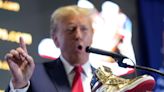 Trump receives mixed reception as he launches $400 gold sneakers day after $355 million court ruling