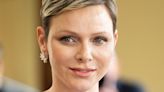 Princess Charlene looks so chic in slim-fit trousers for special appearance with twins