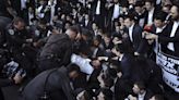 Israeli military says it will begin drafting ultra-Orthodox men. That could rattle the government