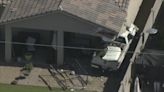 Truck crashes into Phoenix home, possibly causing structure damage