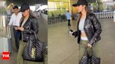 Malaika Arora's bag of whopping cost price steals the show as she makes an appearance in the city | Hindi Movie News - Times of India