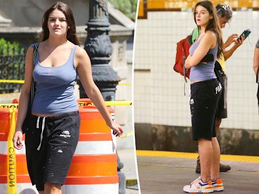 Suri Cruise, 18, beats the summer heat in NYC with tank top and cut-off sweatpants