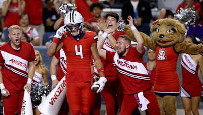 Arizona star Tetairoa McMillan 'had a little procedure' on leg, Wildcats 'expect him back for the season'