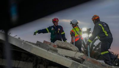 Dozens still missing after South African building collapse; 7 confirmed dead