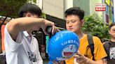 主辦單位鬧市派氣球宣傳「多啦A夢」無人機表演 - RTHK