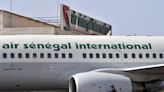 Boeing 737 catches fire and skids off the runway at a Senegal airport, injuring 10 people - WTOP News