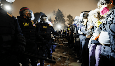 Police raid on UCLA encampment in photos