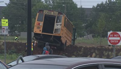 School bus hit by driver who ran red light in University City, CMS says