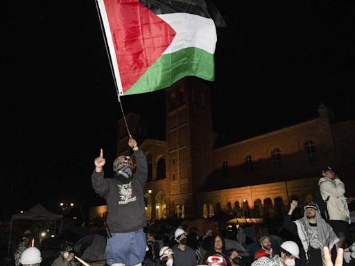 Biden keeps quiet as Gaza protesters and police clash on college campuses