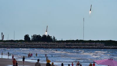 SpaceX Falcon Heavy booster landings, sonic booms wow Kennedy Space Center launch fans