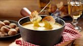 The Fondue Etiquette Tip That Ensures An Enjoyable Dining Experience