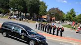 Thousands pay respects to first of two fallen Cobb deputies killed in the line of duty