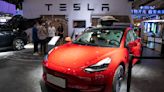 Tesla cuts prices in China on concern over softening demand