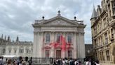 Pro-Palestinian protesters spray red paint on Cambridge graduation building