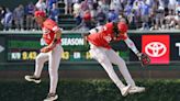 Santiago Espinal hits 2-run homer, Reds hold on to beat Cubs 5-4