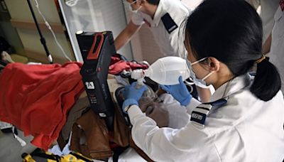 跑馬地的士撞私家車 的士司機昏迷送院