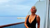 Denise Welch celebrates becoming a 'pensioner' by stripping down in plunging swimsuit