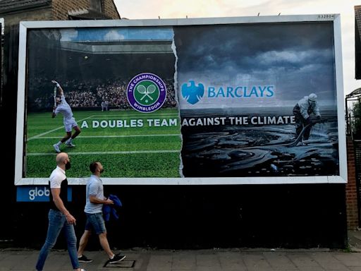 Billboards calling on Wimbledon to drop Barclays as sponsor appear near All England Lawn Tennis Club