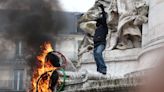 Paris rocked by RIOTS as cops charge protesters with batons before Olympics