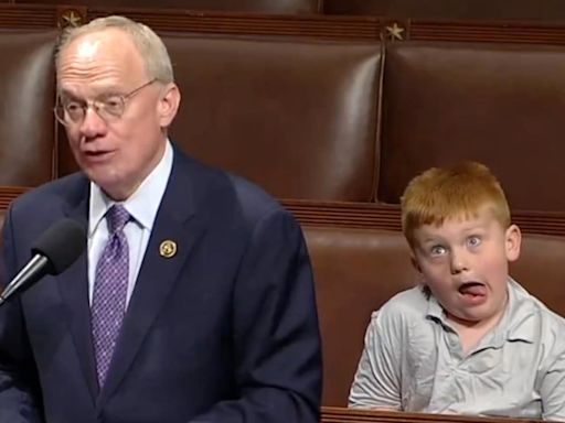 Congressman’s son steals the spotlight while his dad delivers remarks at the Capitol