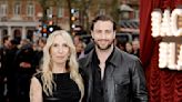 Sam Taylor-Johnson, 57, steps out to vote with Aaron, 33
