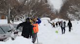 A Buffalo couple who live on a church campus stocked up on food to spend Christmas with their 9 kids — but when the storm hit, they opened their doors to 130 strangers instead