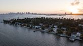 Miami-Dade sets home price record, yet sales tumble. Broward reports similar housing trend