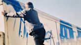 Never-before-seen photos of Banksy show him painting mural before he was famous
