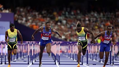 Grant Holloway captures golden redemption with hurdles win