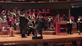 Student breaks into celebratory dance at graduation